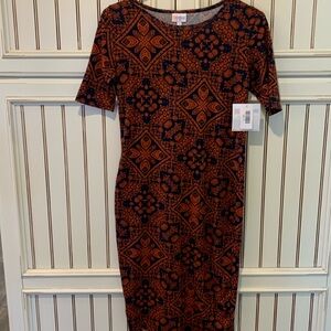 LuLaRoe Julia small . Polyester spandex tons of stretch brand new with tags.